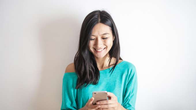 woman happy to be approved for an online loan