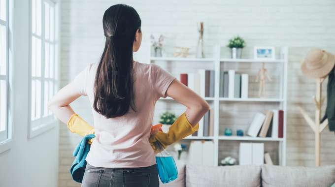 Person tidying & decluttering their home