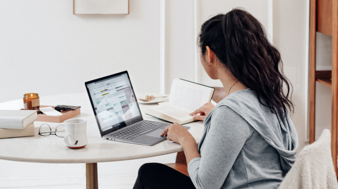 Person filing their taxes on a laptop