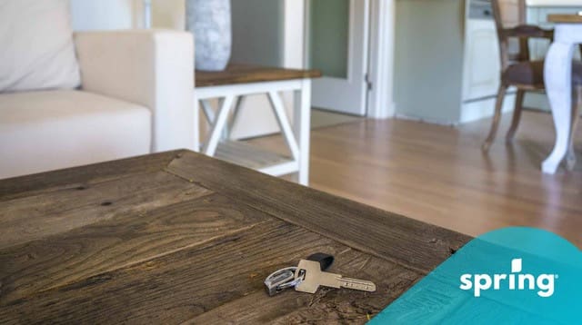 House keys on the table of home in Canada that is being rented to own