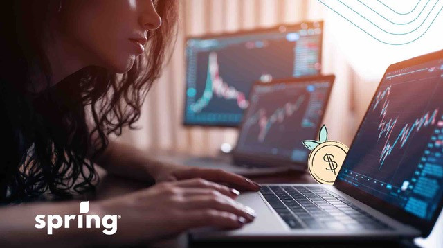 Woman at computer showing day trading taxes in Canada