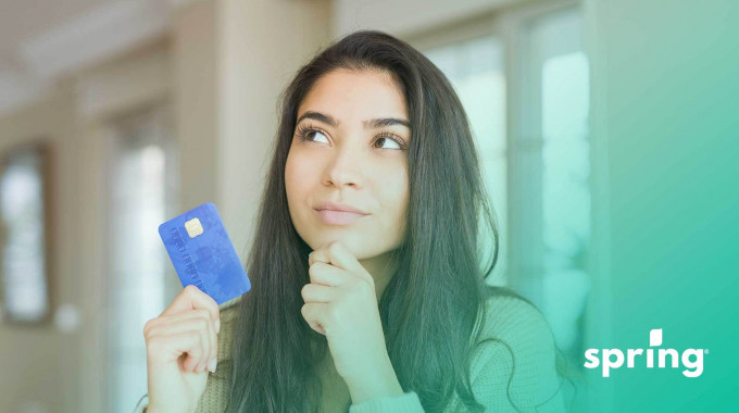 Woman holding credit card